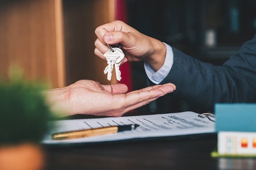 Handing Keys Over To Property Owner